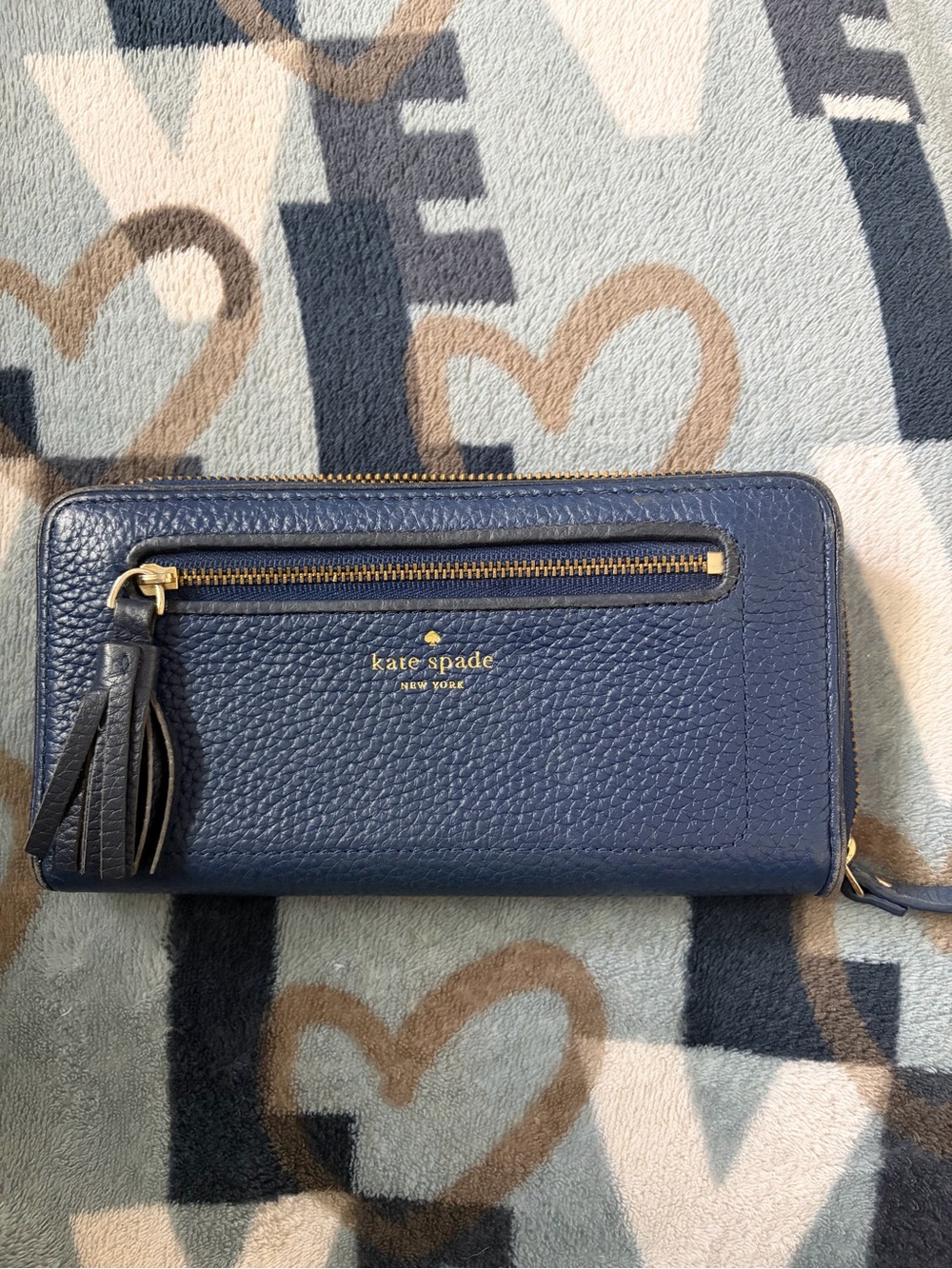 kate spade Navy Pebbled Leather Zip-Around Wallet with Tassel